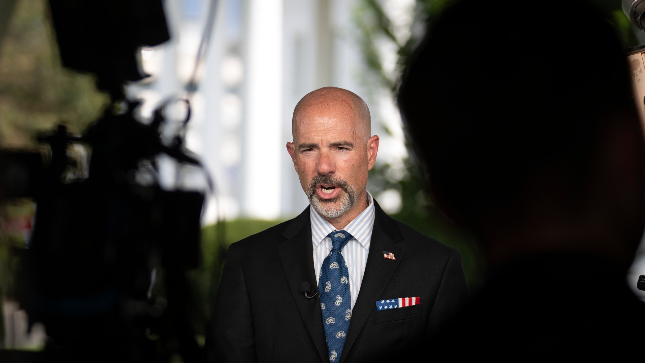 Drug Enforcement Agency Administrator Terrance Cole speaks during a television interview outside the White House, Tuesday, Aug. 12, 2025, in Washington. (AP Photo/Mark Schiefelbein)