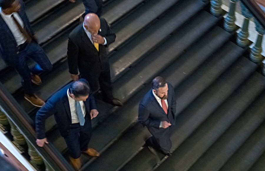 House Speaker Dustin Borrow, R - Lubbock, leaves the House floor on his way to a Republican Caucus meeting after Sine Die for the special session, Friday, Aug. 15, 2025, in Austin, Texas. (AP Photo/Rodolfo Gonzalez)