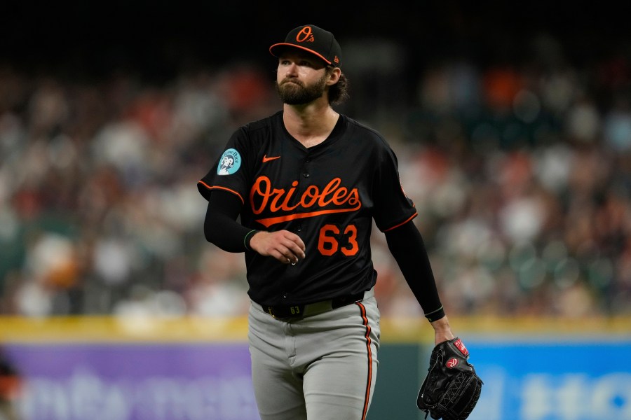 Baltimore Orioles starting pitcher Brandon Young returns to the dugout after the eighth inning of a baseball game against the Houston Astros in Houston, Friday, Aug. 15, 2025. (AP Photo/Ashley Landis)