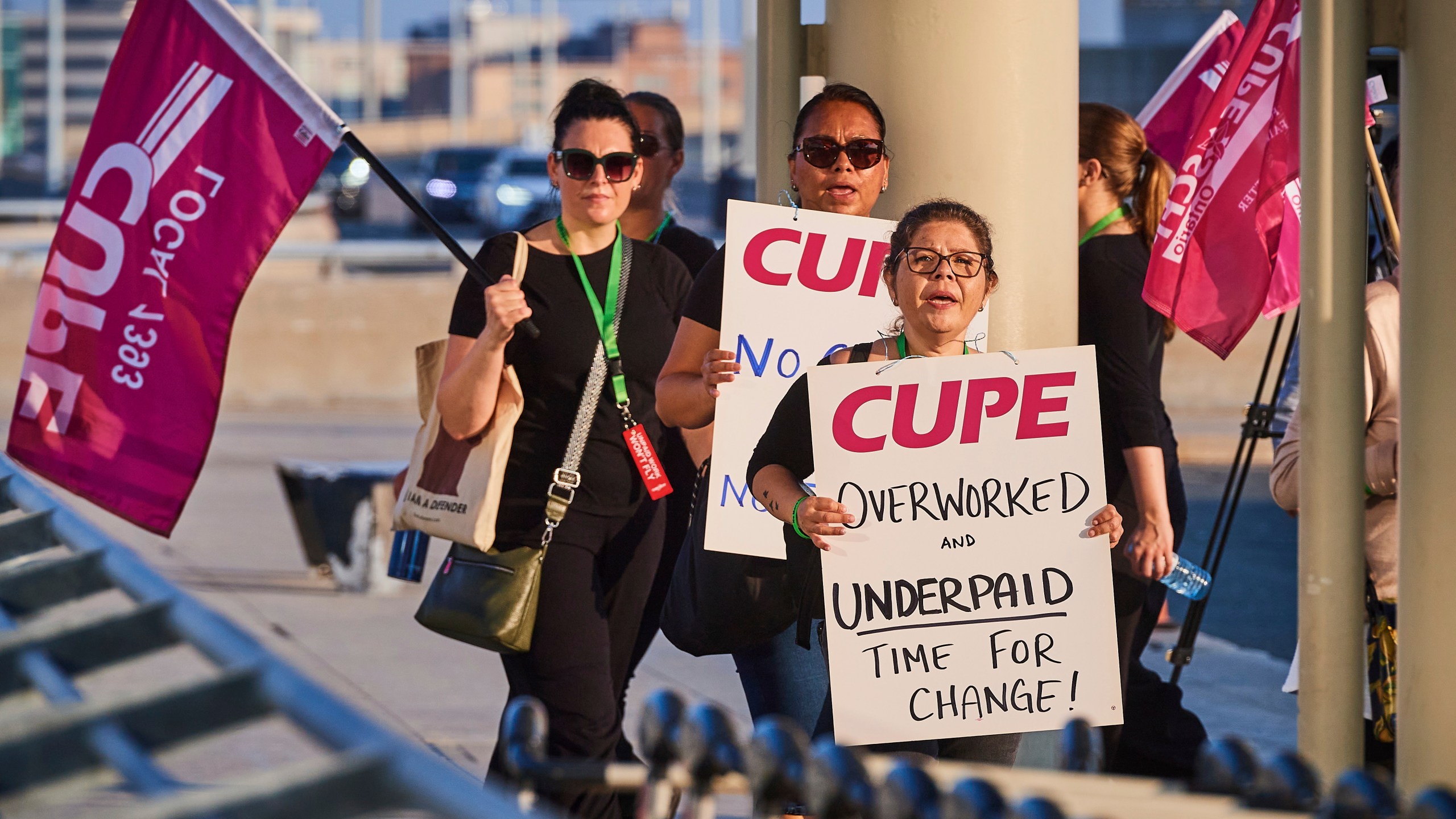 Air Canada flight attendants picket at Pearson International Airport in Toronto on Saturday, Aug. 16, 2025. (Sammy Kogan/The Canadian Press via AP)