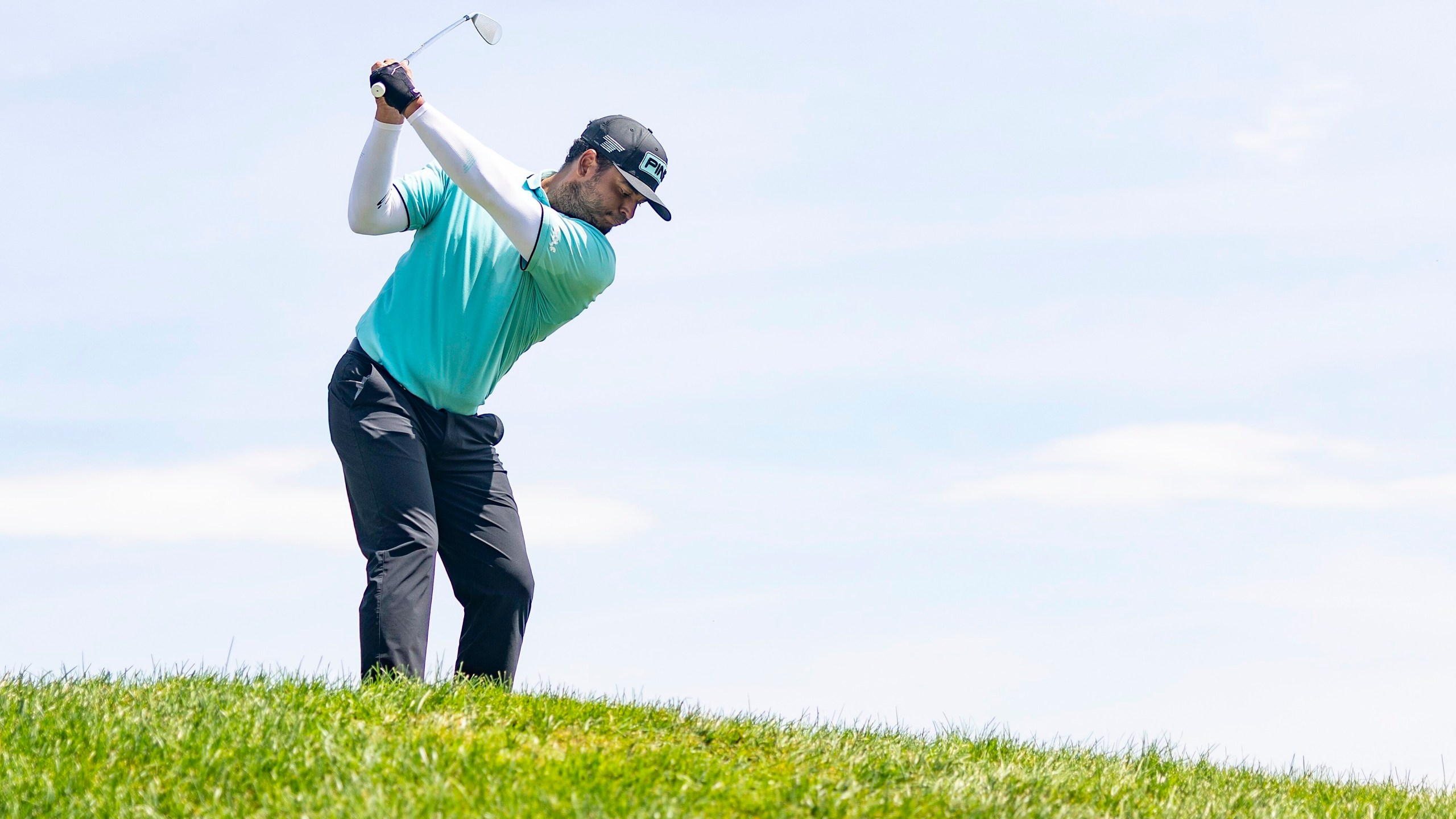 Sebastián Muñoz, of Torque GC, hits from the sixth fairway during the final round of LIV Golf Indianapolis at The Club at Chatham Hills, Sunday, Aug. 17, 2025, in Westfield, Ind. (Scott Taetsch/LIV Golf via AP)