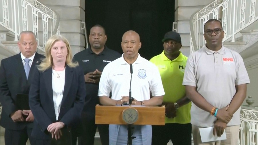 This image taken from video provided by the New York Police Department shows mayor Eric Adams speaking during a news conference in New York, Sunday, Aug. 17, 2025. (NYPD via AP)