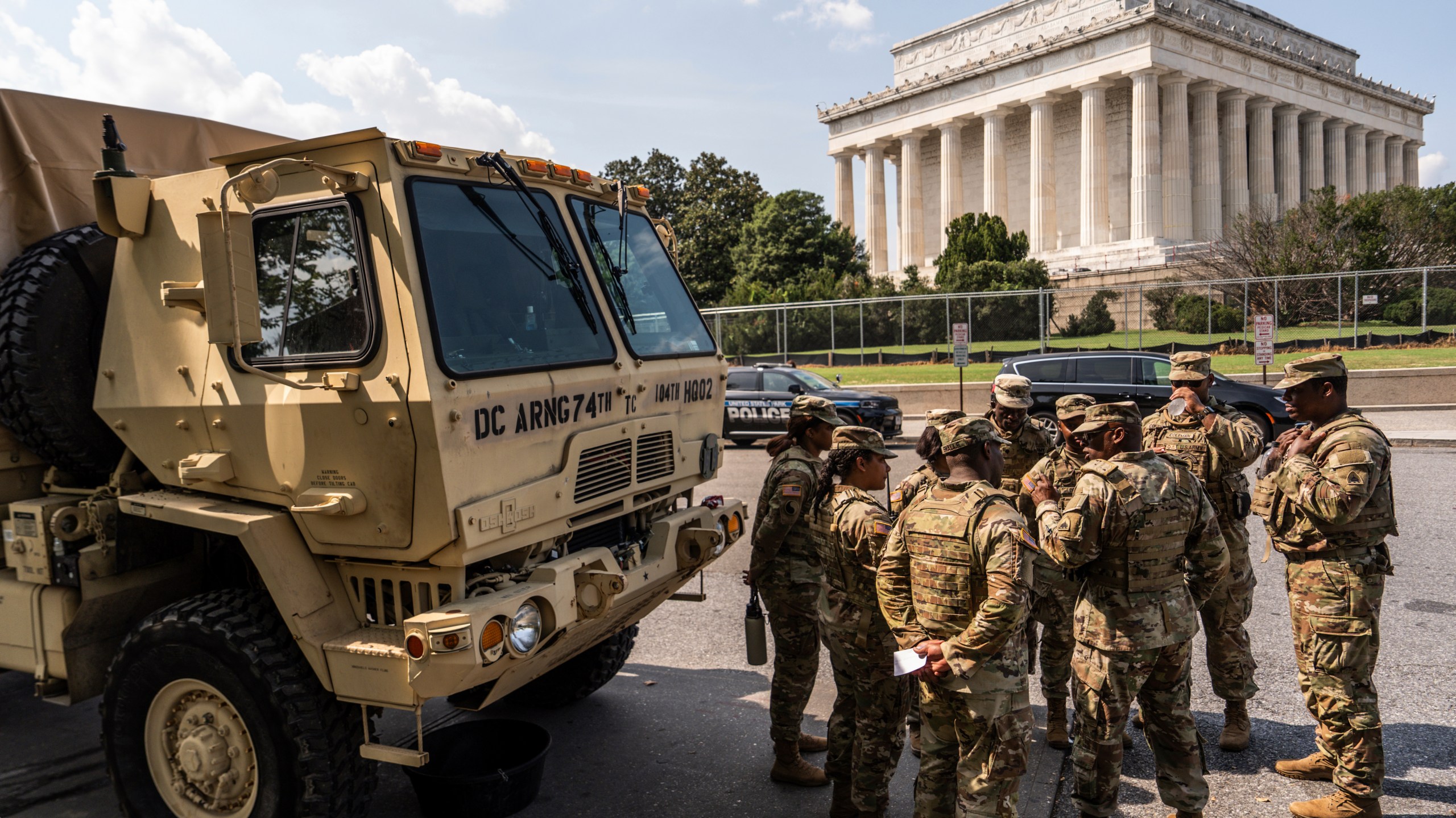 Members of the District of Columbia National Guard gather next to the Lincoln Memorial, Sunday, Aug. 17, 2025, in Washington. (AP Photo/Julia Demaree Nikhinson)