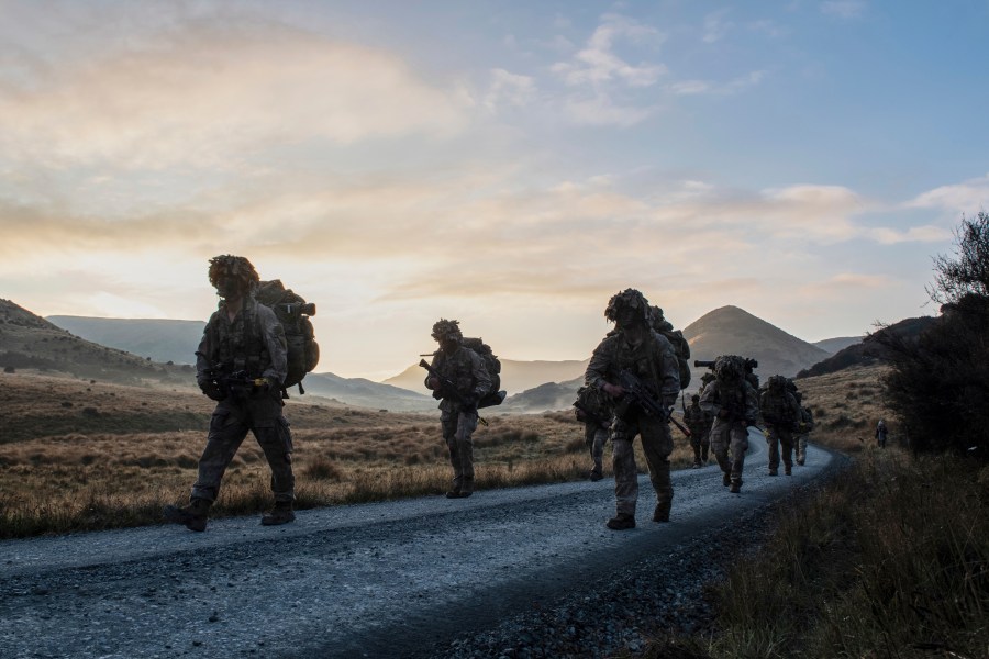 New Zealand army officer cadets move on exercise in the Waiouru training area in the central North Island of New Zealand, May 6, 2022. (Corporal Naomi James/NZDF via AP)