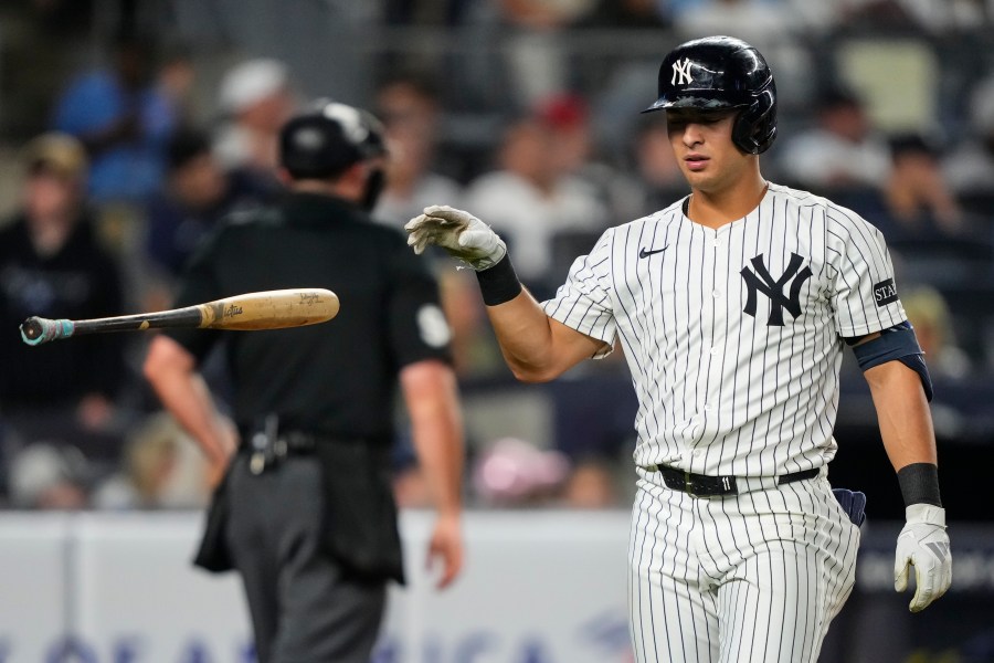 New York Yankees' Anthony Volpe (11) drops a bat after striking out during the fourth inning of a baseball game against the Minnesota Twins, Wednesday, Aug. 13, 2025, in New York. (AP Photo/Yuki Iwamura)