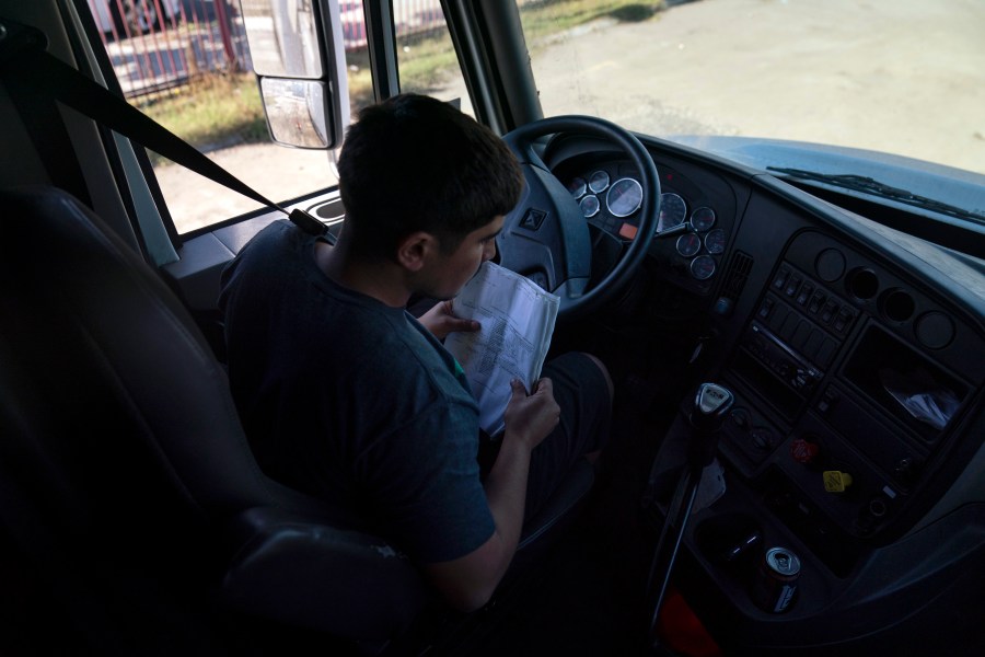 FILE - Student driver Edgar Lopez, 23, prepares for a practice driving session at California Truck Driving Academy in Inglewood, Calif., Monday, Nov. 15, 2021. (AP Photo/Jae C. Hong), File)