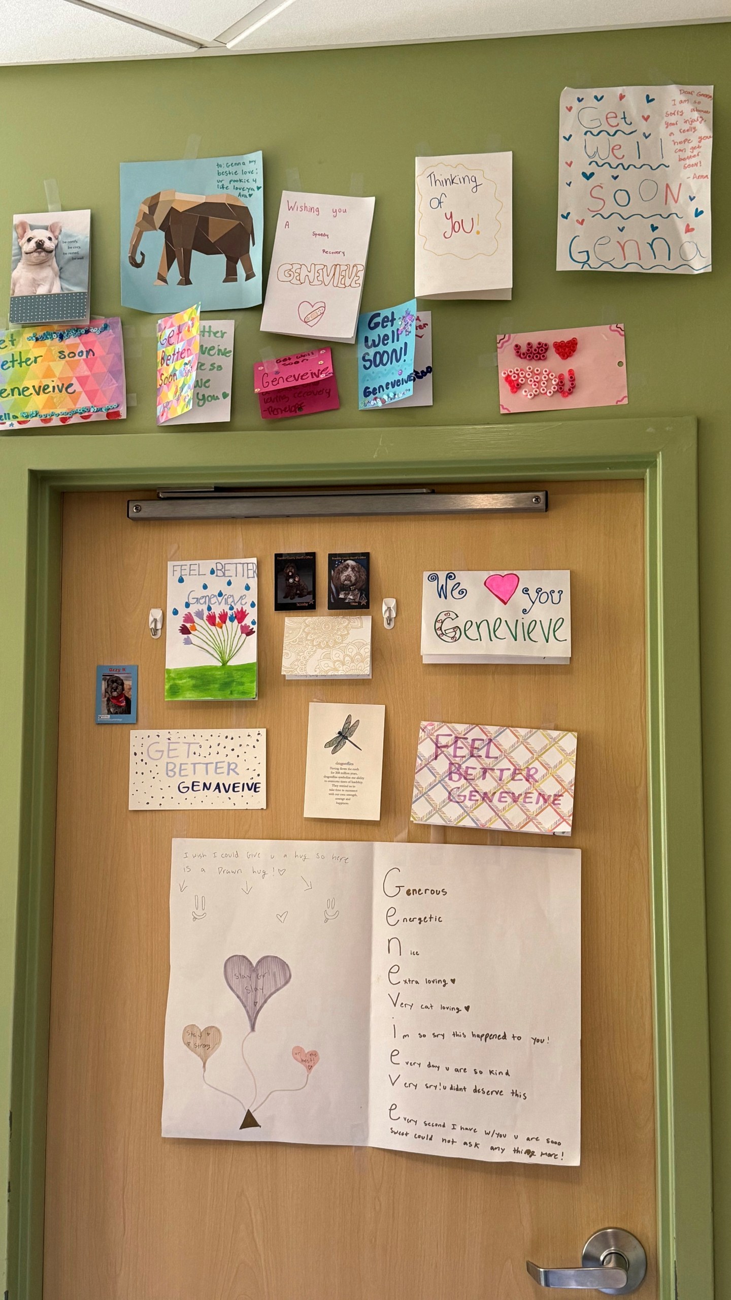 In this photo provided by Wanda Stipek, cards made by classmates for Minneapolis shooting victim Genevieve Bisek are seen taped to the wall of Genevieve's hospital room at Hennepin County Medical Center in Minneapolis, Saturday, Aug. 30, 2025. (Wanda Stipek via AP)