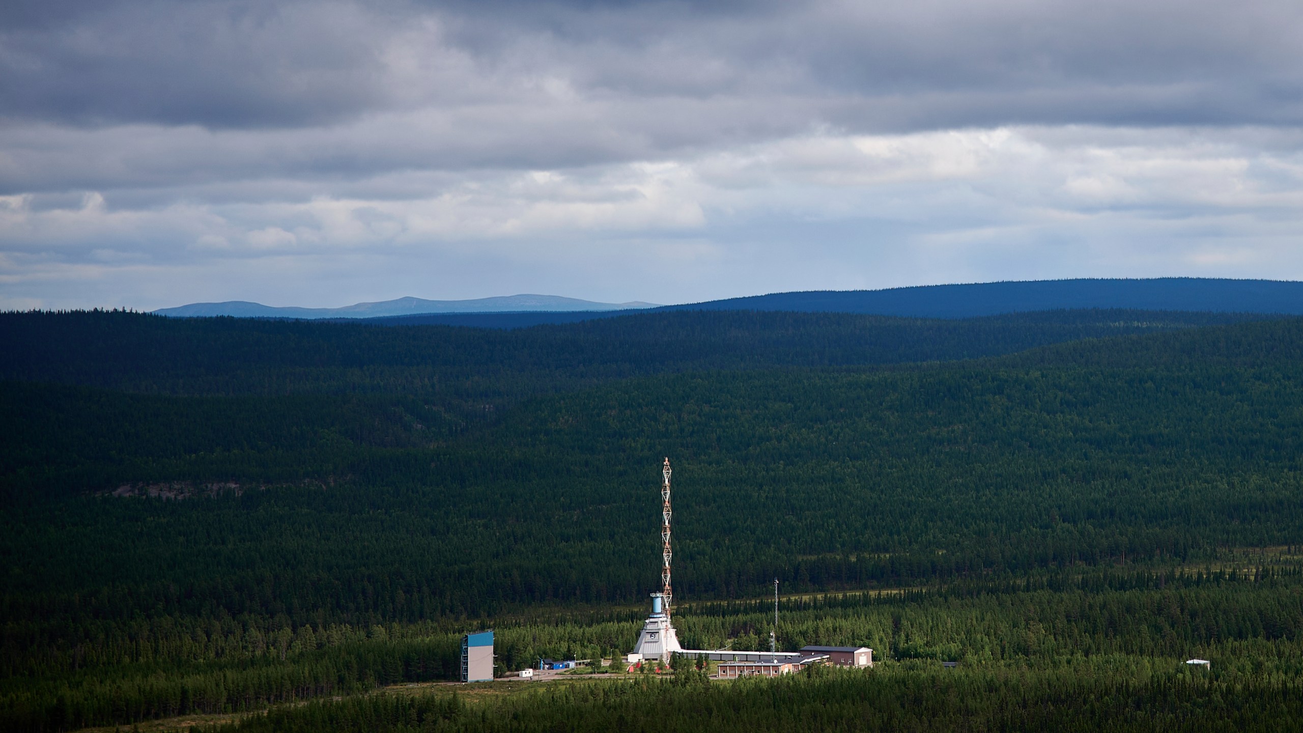 Rays of sunlight filter through the clouds illuminating the Esrange Space Center, a base deep in the Swedish forest and a part of Europe's hope to compete in the space race in Kiruna, Sweden, Tuesday, Aug. 19, 2025. (AP Photo/Malin Haarala)