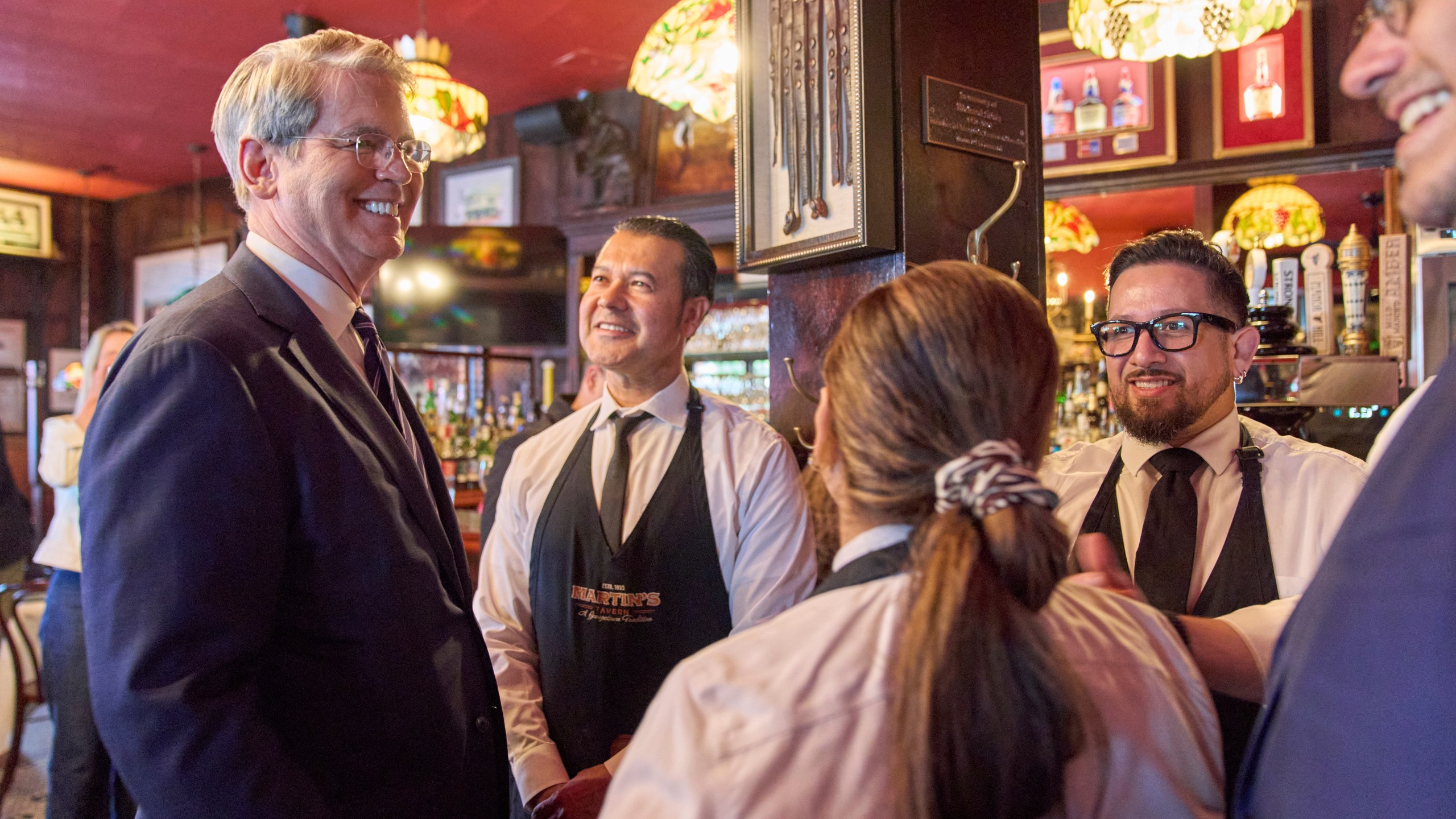 Treasury Secretary Scott Bessent visits Martin's Tavern, Monday, Sept. 1, 2025, in the Georgetown neighborhood of Washington, during an area restaurant tour about no taxes on tips and overtime. (AP Photo/Jacquelyn Martin)