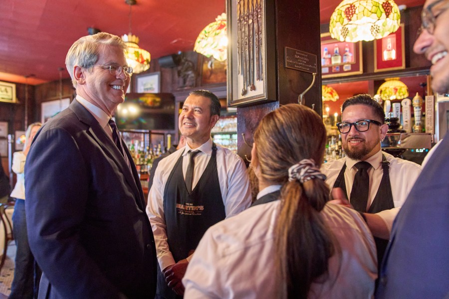 Treasury Secretary Scott Bessent visits Martin's Tavern, Monday, Sept. 1, 2025, in the Georgetown neighborhood of Washington, during an area restaurant tour about no taxes on tips and overtime. (AP Photo/Jacquelyn Martin)