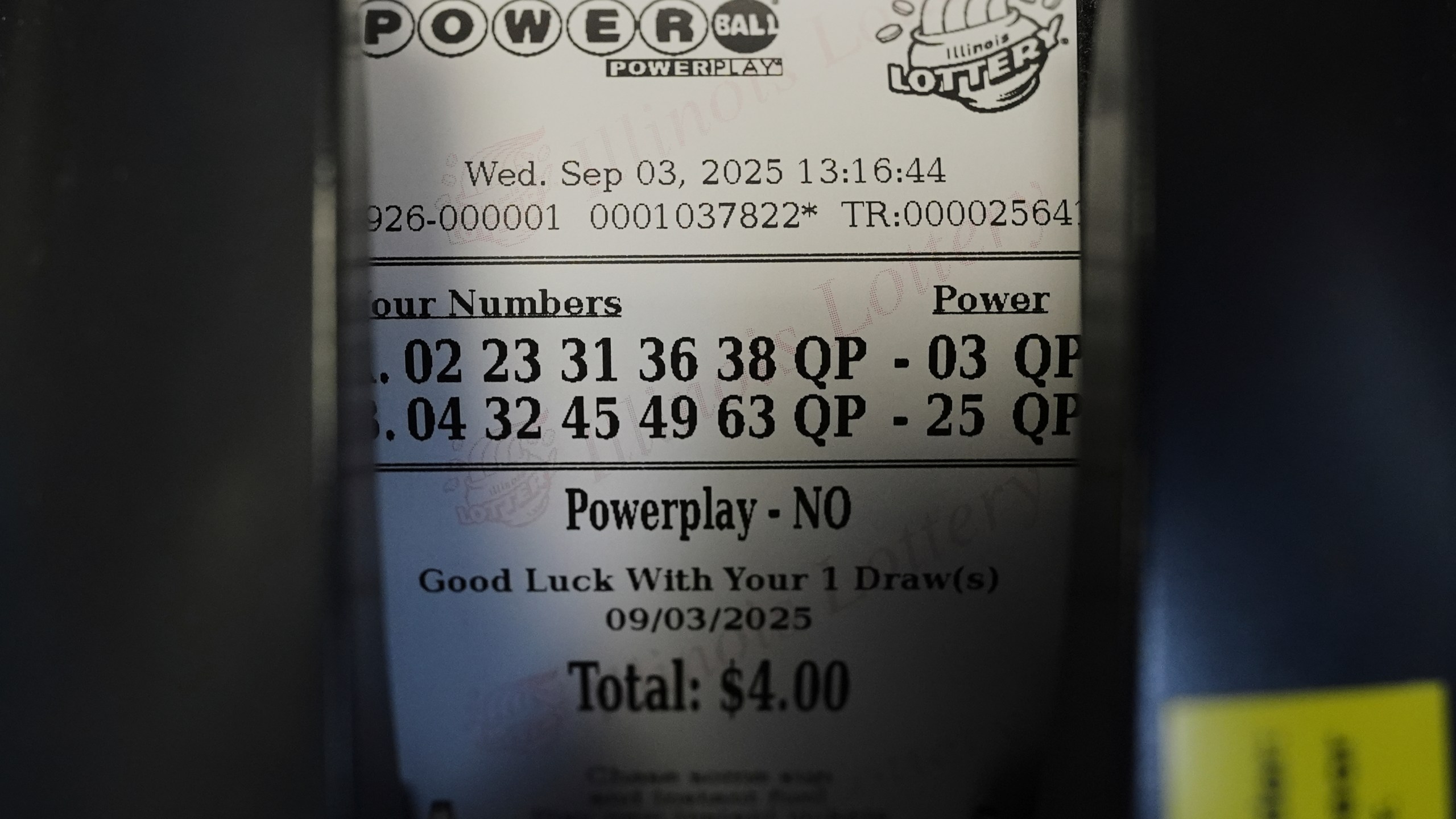 A Powerball lottery ticket is printed out of a lottery machine at a convenience store in Northbrook, Ill., Wednesday, Sept. 3, 2025. (AP Photo/Nam Y. Huh)