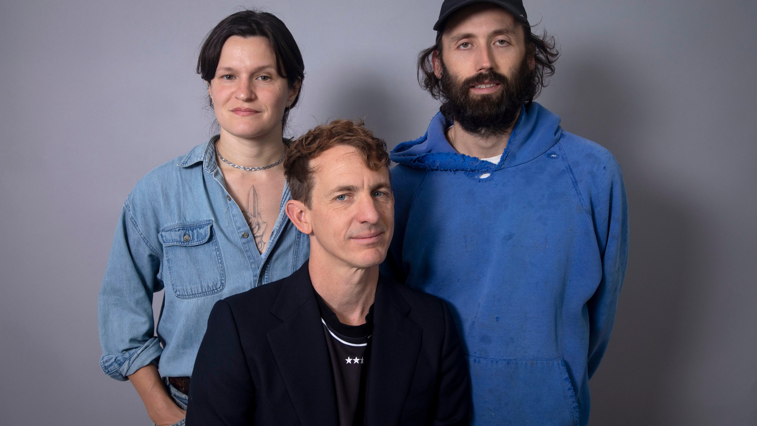 Adrianne Lenker, from left, Buck Meek and James Krivchenia of the band Big Thief pose for a portrait on Tuesday, Sept. 2, 2025, in New York. (Photo by Andy Kropa/Invision/AP)