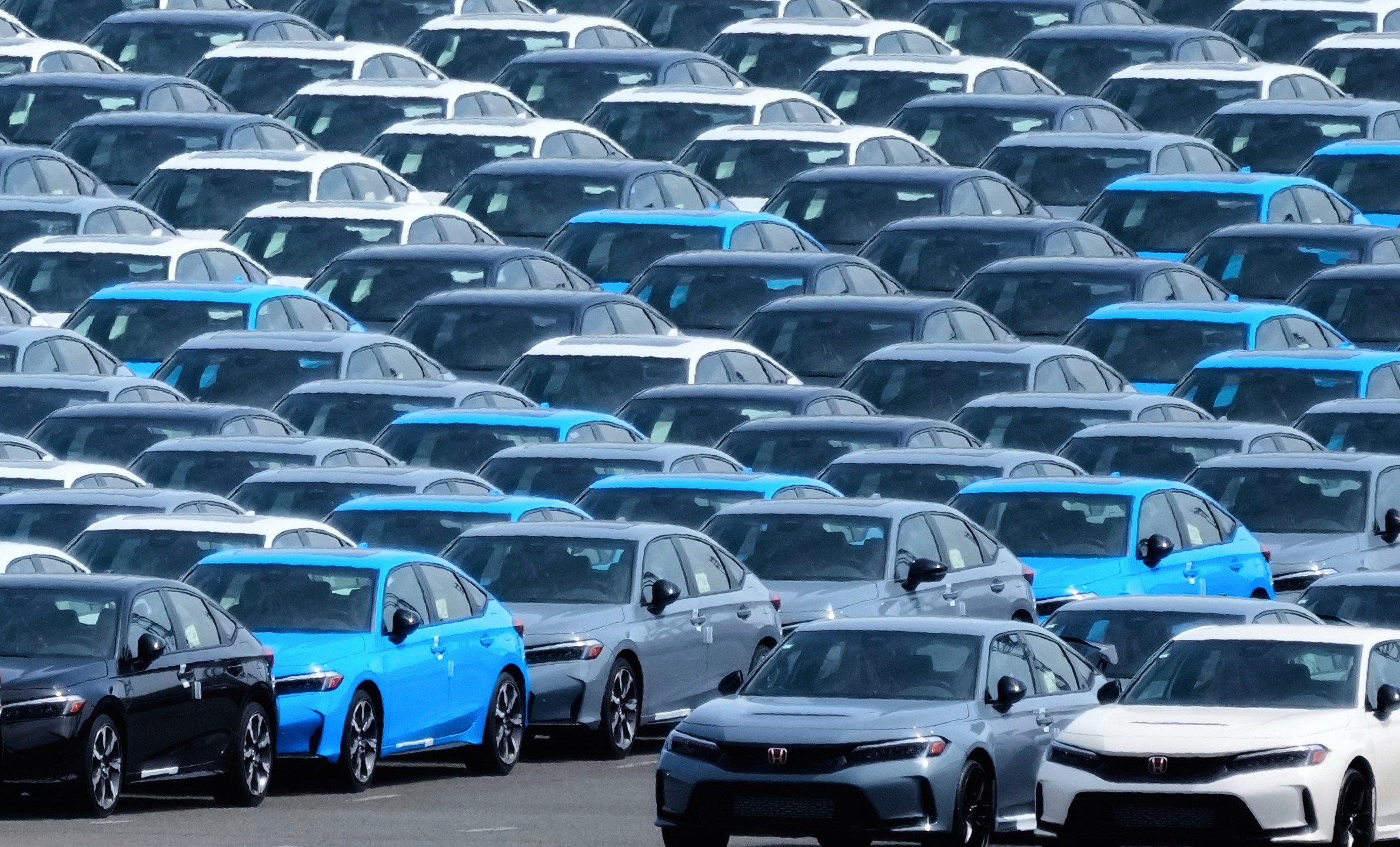 FILE - Export vehicles are parked at Daikoku Pier in Yokohama, near Tokyo, April 8, 2025. (AP Photo/Hiro Komae, File)