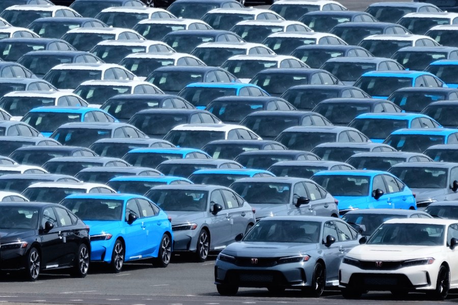 FILE - Export vehicles are parked at Daikoku Pier in Yokohama, near Tokyo, April 8, 2025. (AP Photo/Hiro Komae, File)
