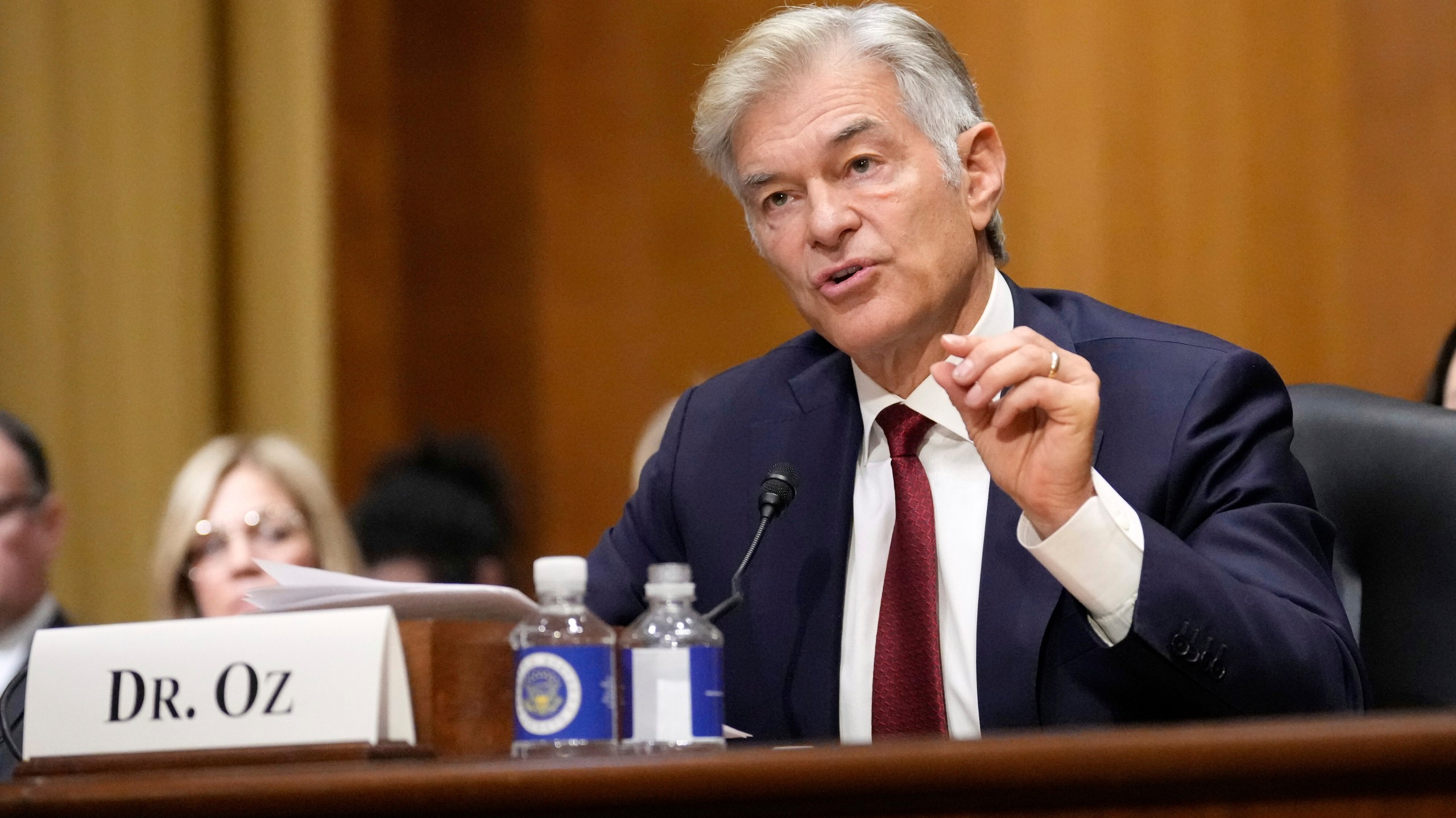 FILE - Dr. Mehmet Oz, President Donald Trump's pick to lead the Centers for Medicare and Medicaid Services, testifies at his confirmation hearing before the Senate Finance Committee on Capitol Hill in Washington, March 14, 2025. (AP Photo/Ben Curtis, File)