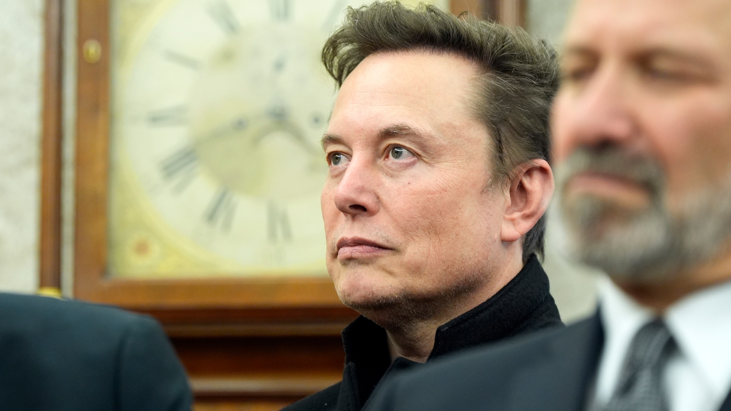 FILE - Elon Musk listens as President Donald Trump meets with India's Prime Minister Narendra Modi in the Oval Office of the White House, Feb. 13, 2025, in Washington. (Photo/Alex Brandon, File)