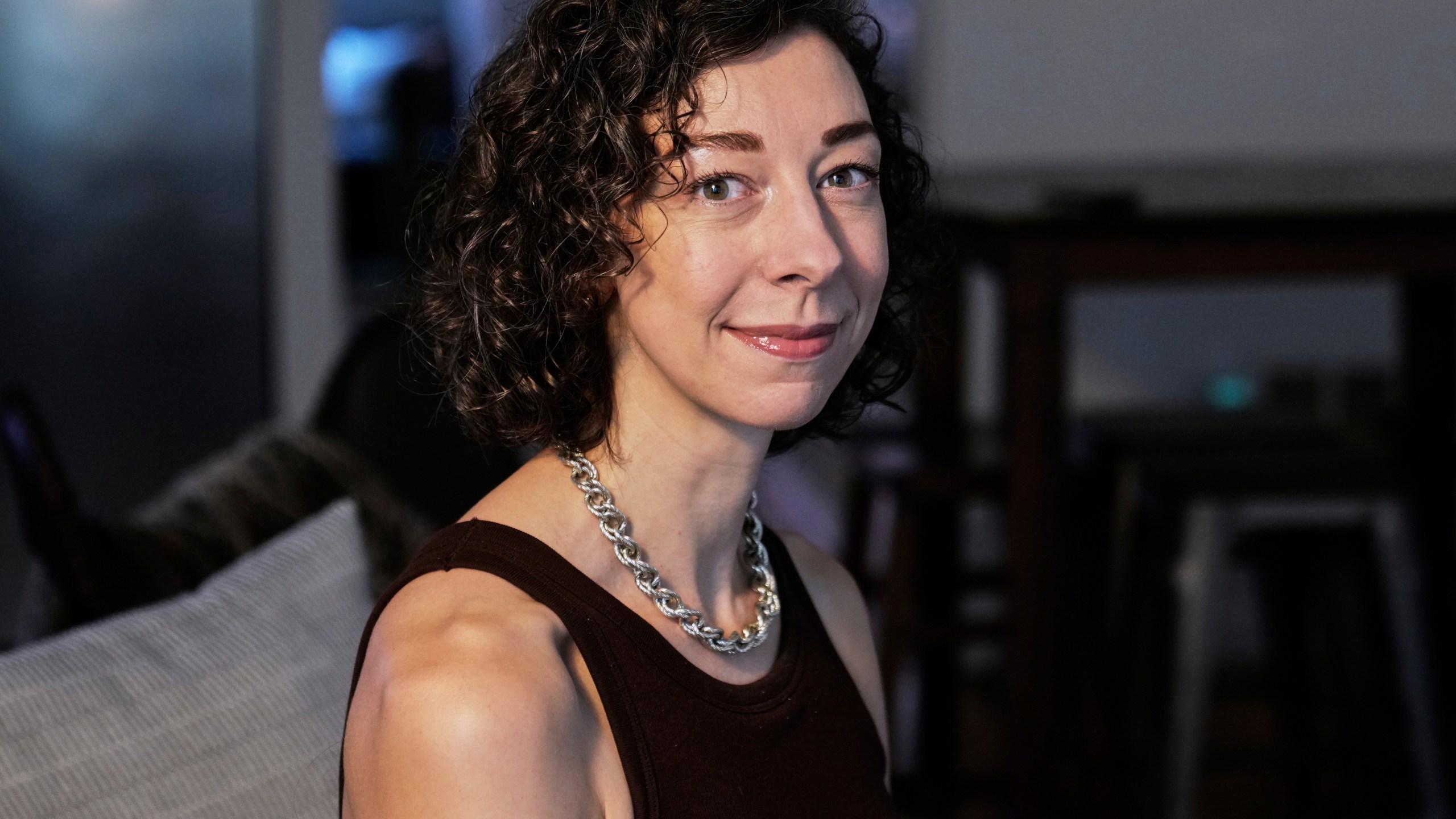 Thriller novelist Andrea Bartz is photographed in her home, in the Brooklyn borough of New York, Thursday, Sept. 4, 2025 (AP Photo/Richard Drew)