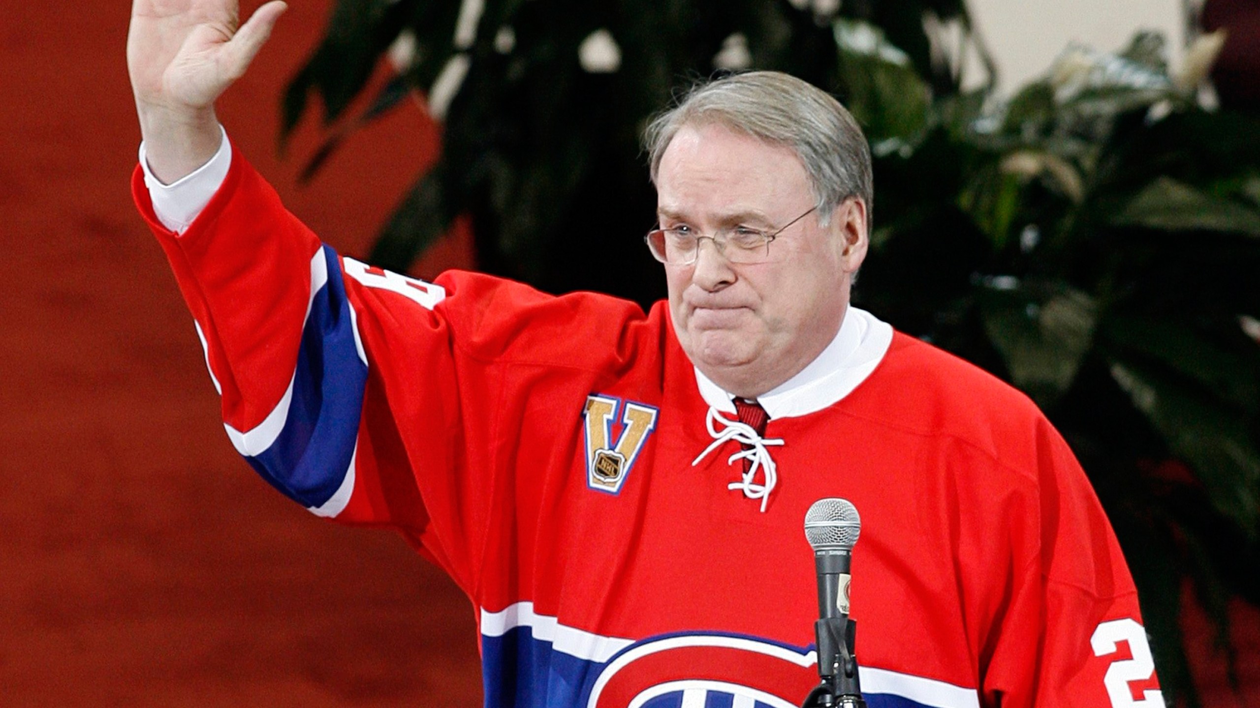 FILE - Former Montreal Canadiens goaltender Ken Dryden waves to the crowd at the Bell Centre as his number is retired during a pre-game ceremony, on Jan. 29, 2007 in Montreal. (Ryan Remiorz/The Canadian Press via AP, File)