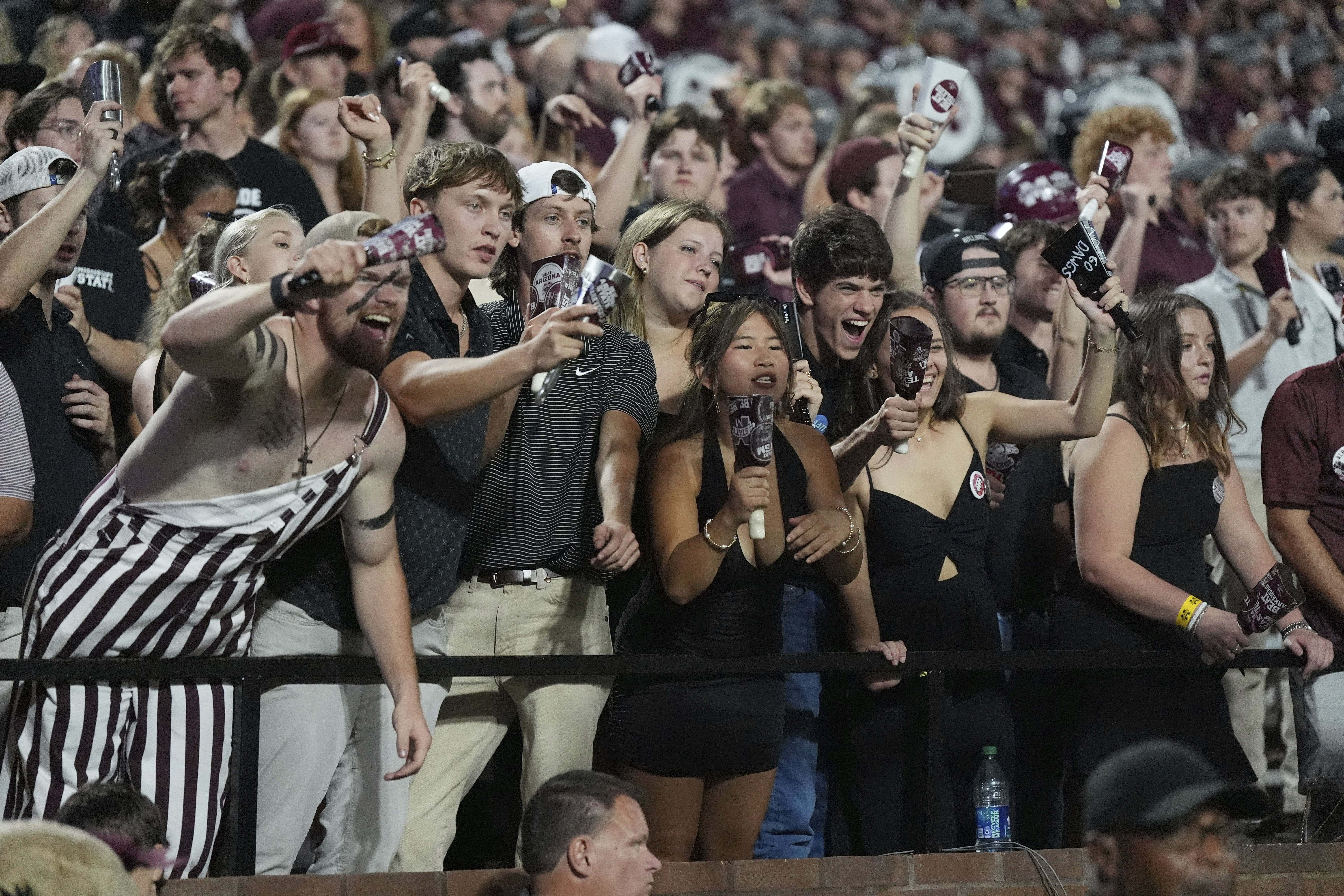 Mississippi State fans react to the team winning an NCAA college football game against Arizona State in Starkville, Miss., Saturday, Sept. 6, 2025. (AP Photo/Rogelio V. Solis)