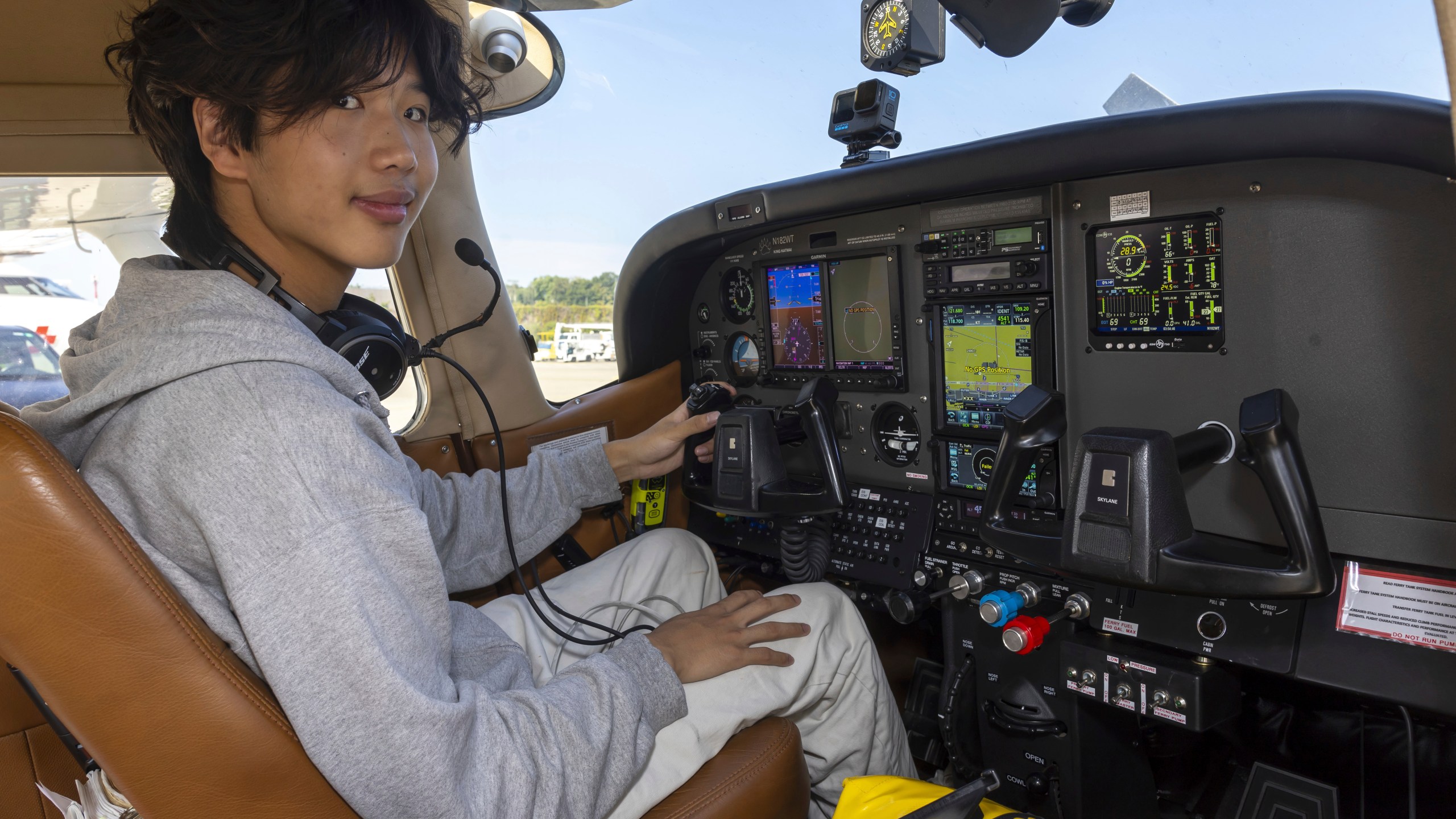 FILE - American pilot Ethan Guo poses for the photographer in Geneva, Switzerland, Tuesday, Aug. 6, 2024, before his take off from Geneva Airport for attempting a world record solo flight to all seven continents. (Salvatore Di Nolfi/Keystone via AP,File)