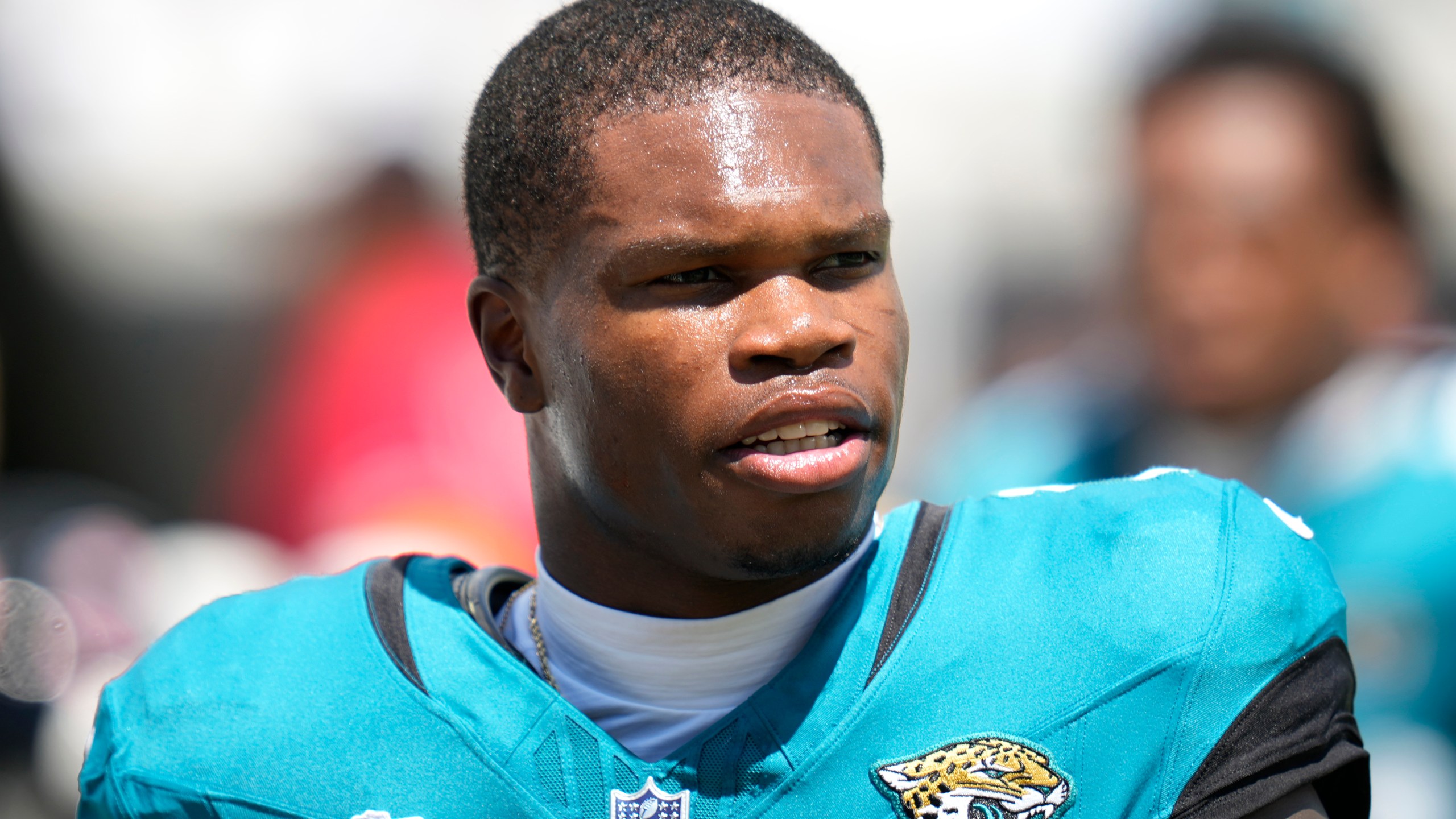 Jacksonville Jaguars wide receiver Travis Hunter (12) looks on before an NFL football game against the Carolina Panthers, Sunday, Sept. 7, 2025, in Jacksonville, Fla. (AP Photo/John Raoux)