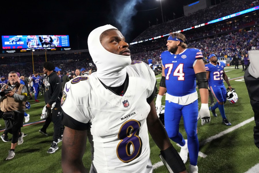 Baltimore Ravens quarterback Lamar Jackson (8) walks off the field after the team's loss to the Buffalo Bills in an NFL football game in Orchard Park, N.Y., Sunday, Sept. 7, 2025. (AP Photo/Gene J. Puskar)