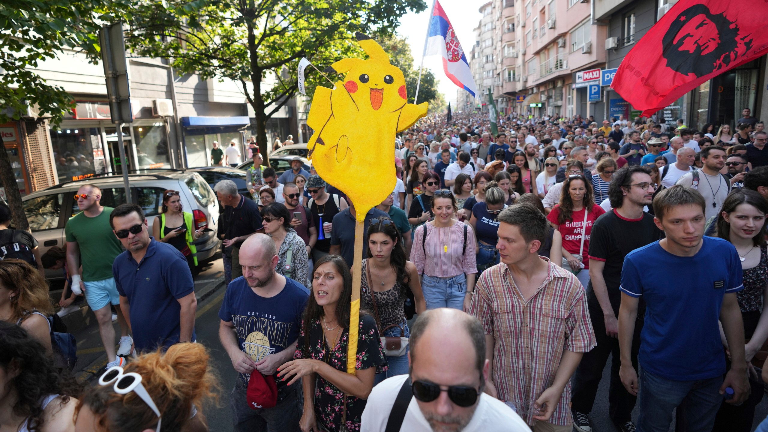 Led by university students, people attend a protest against increasing police brutality in Belgrade, Serbia, Monday, Sept. 8, 2025. (AP Photo/Darko Vojinovic)