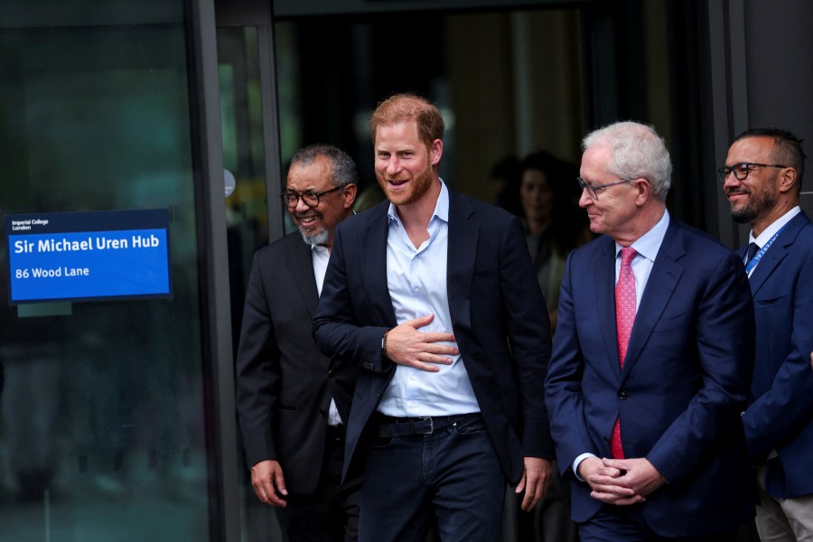 Britain's Prince Harry reacts, as he departs, following his visit to Centre for Blast Injury Studies at Imperial College London, in London, Wednesday, Sept. 10, 2025. (Suzanne Plunkett, Pool Photo via AP)