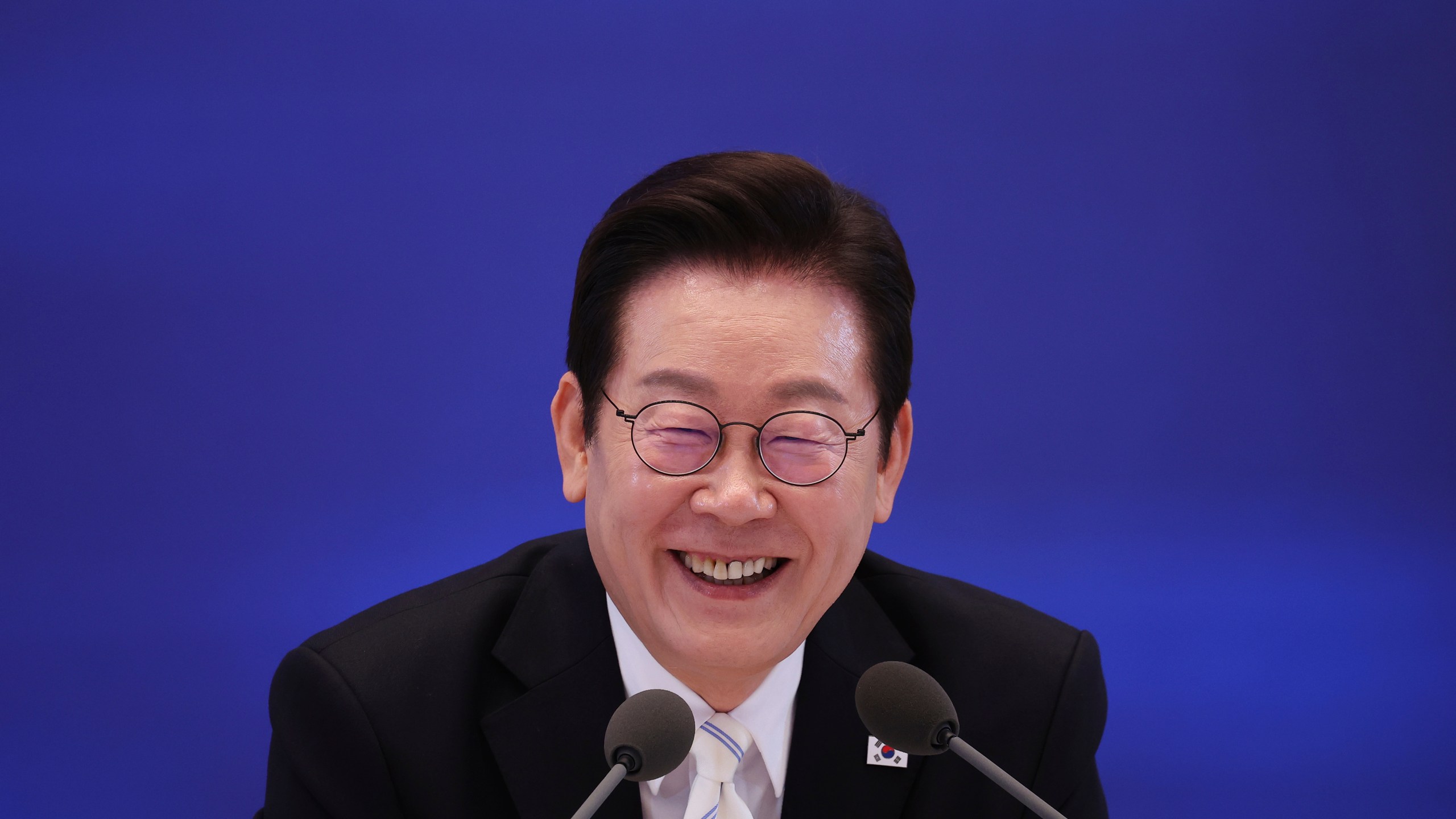 South Korean President Lee Jae Myung reacts during a news conference to mark 100 days in office at the Blue House in Seoul, South Korea, Sept, 11, 2025. (Kim Hong-Ji/Pool Photo via AP)