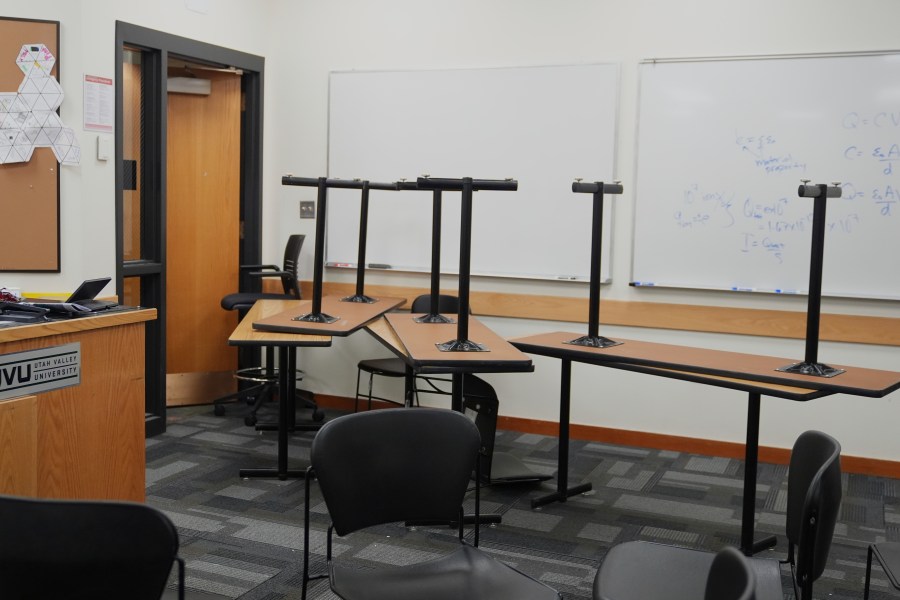 Chairs and tables are stacked in a classroom a day after the shooting of Charlie Kirk at Utah Valley University in Orem, Utah, Thursday, Sept. 11, 2025. (AP Photo/Lindsey Wasson)