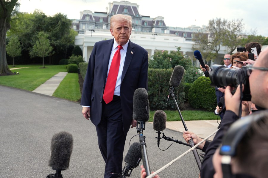 President Donald Trump speaks with reporters before boarding Marine One on the South Lawn of the White House, Thursday, Sept. 11, 2025, in Washington. (AP Photo/Evan Vucci)