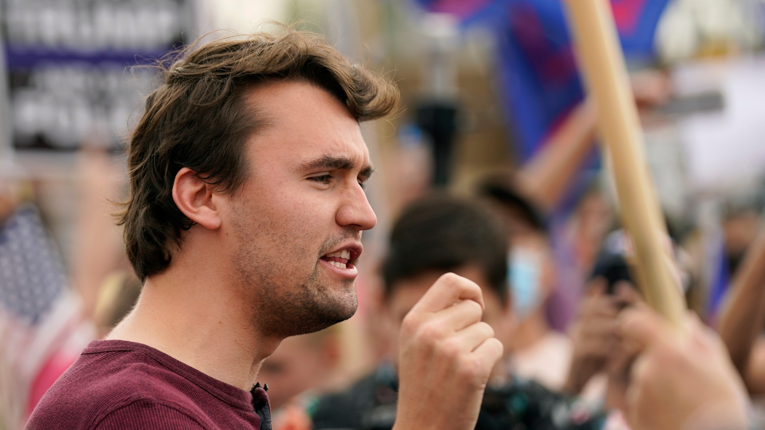 FILE - Charlie Kirk, conservative activist and founder of Turning Point USA, speaks to supporters of President Donald Trump at a rally outside the Maricopa County Recorder's Office, Friday, Nov. 6, 2020, in Phoenix. (AP Photo/Ross D. Franklin, File)