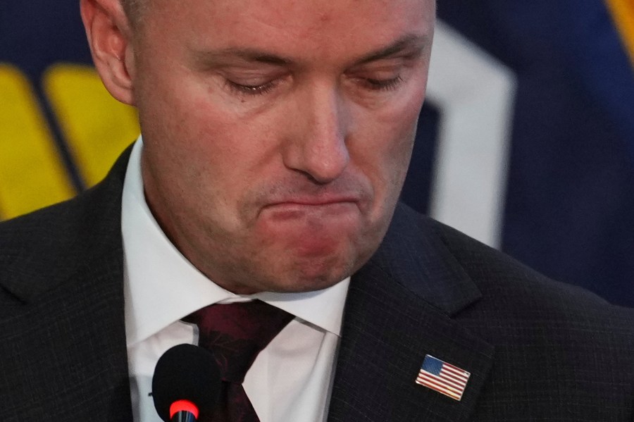 Utah Gov. Spencer Cox pauses as he speaks at a news conference, Friday, Sept. 12, 2025, in Orem, Utah. (AP Photo/Lindsay Wasson)
