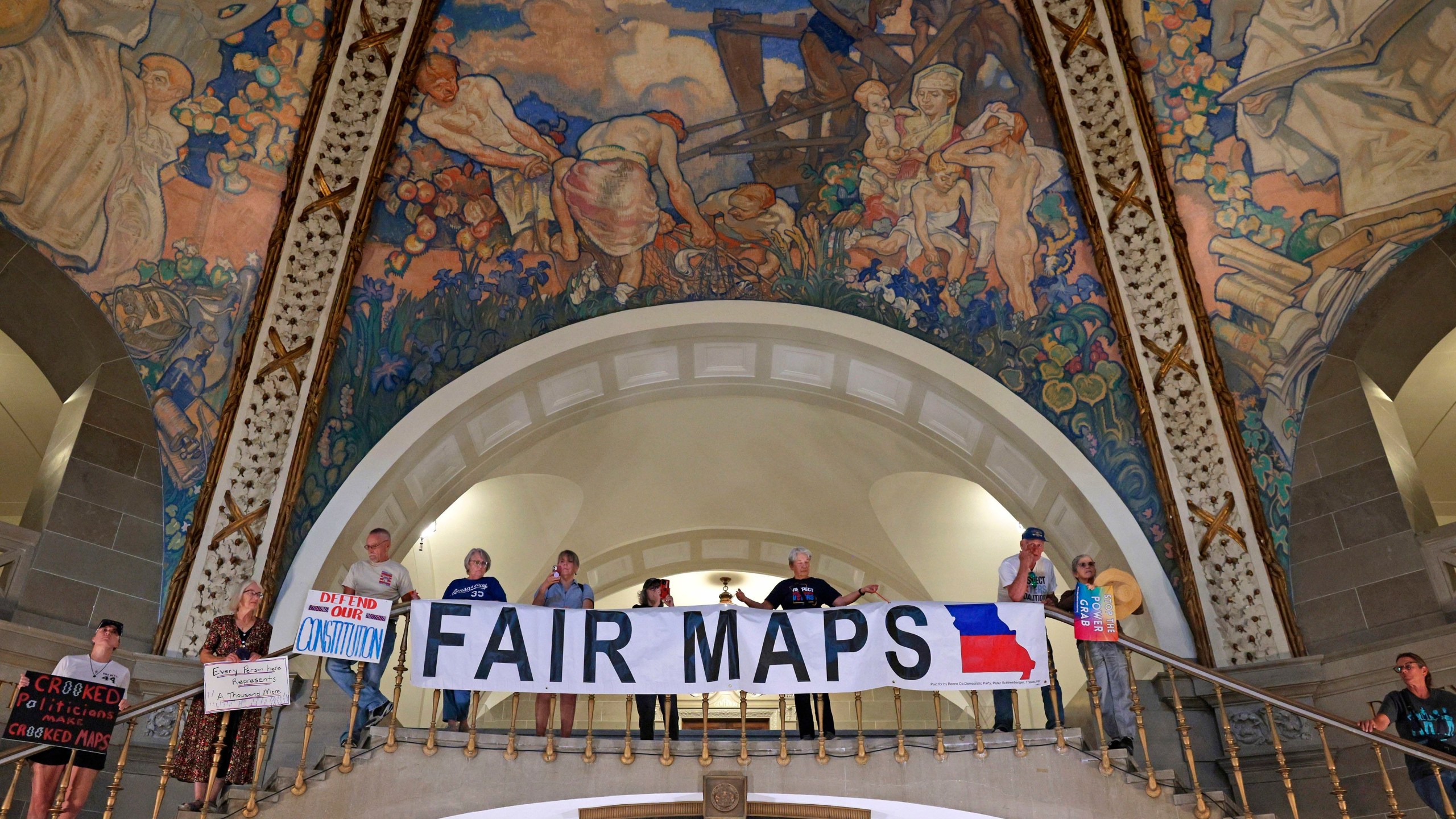 People opposed to a plan to redraw Missouri's U.S. House districts gather at the state Capitol in Jefferson City, Mo. on Wednesday, Sept. 10, 2025. (Christian Gooden/St. Louis Post-Dispatch via AP)
