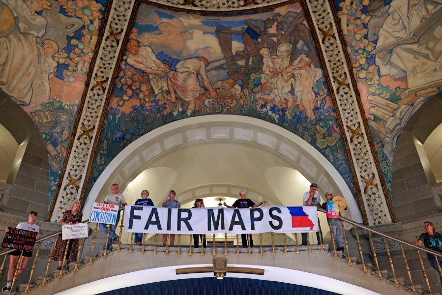 People opposed to a plan to redraw Missouri's U.S. House districts gather at the state Capitol in Jefferson City, Mo. on Wednesday, Sept. 10, 2025. (Christian Gooden/St. Louis Post-Dispatch via AP)
