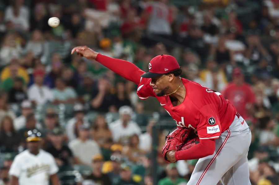 Cincinnati Reds pitcher Hunter Greene throws to the Athletics during the third inning of a baseball game Saturday, Sept. 13, 2025, in West Sacramento, Calif. (AP Photo/Sara Nevis)