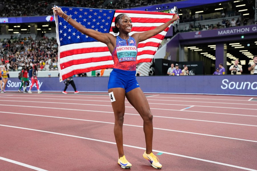United States' Melissa Jefferson-Wooden reacts after winning the women's 100 meters final at the World Athletics Championships in Tokyo, Sunday, Sept. 14, 2025. (AP Photo/Ashley Landis)