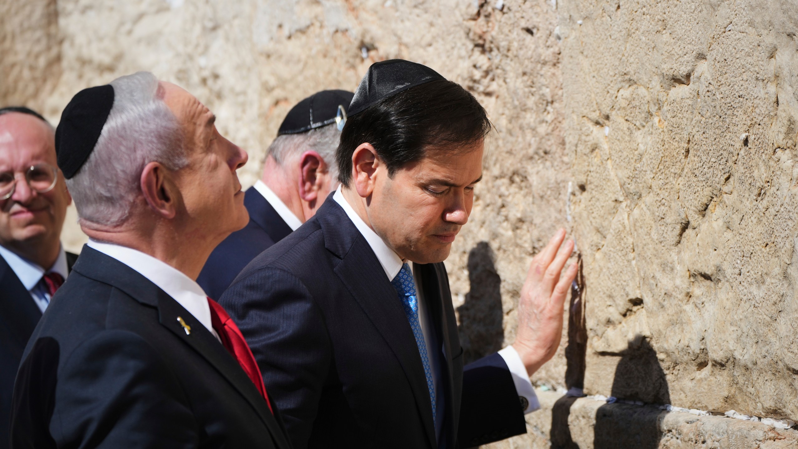 Israeli Prime Minister Benjamin Netanyahu, left, and U.S. Secretary of State Marco Rubio visit the Western Wall, the holiest site where Jews can pray, in the Old City of Jerusalem Sunday, Sept. 14, 2025. (AP Photo/Ariel Schalit)