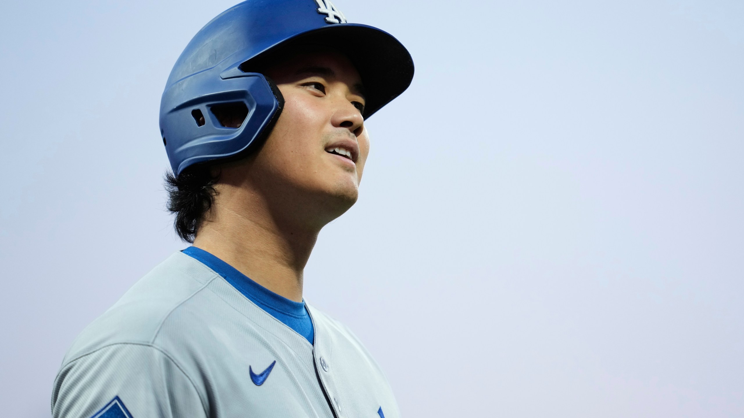 Los Angeles Dodgers' Shohei Ohtani walks to the dugout after being called out on strikes during the fourth inning of a baseball game against the San Francisco Giants, Saturday, Sept. 13, 2025, in San Francisco. (AP Photo/Godofredo A. Vásquez)