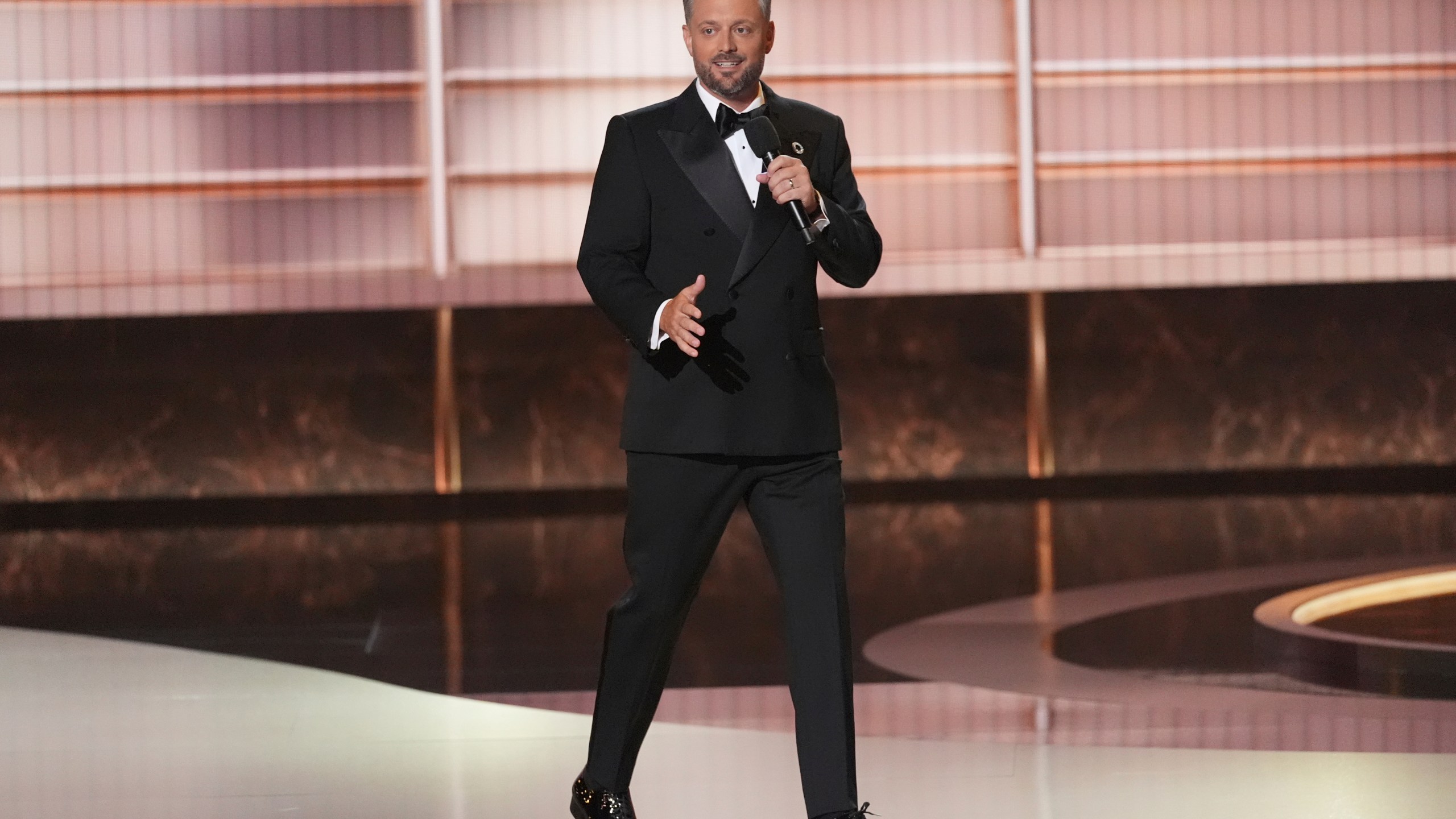 Host Nate Bargatze speaks during the 77th Primetime Emmy Awards on Sunday, Sept. 14, 2025, at the Peacock Theater in Los Angeles. (AP Photo/Chris Pizzello)