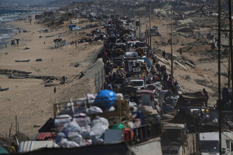 Displaced Palestinians flee northern Gaza along the coastal road toward the south, after Israel's military says its expanded operation in Gaza City has begun and warns residents to leave, Tuesday, Sept. 16, 2025. (AP Photo/Abdel Kareem Hana)