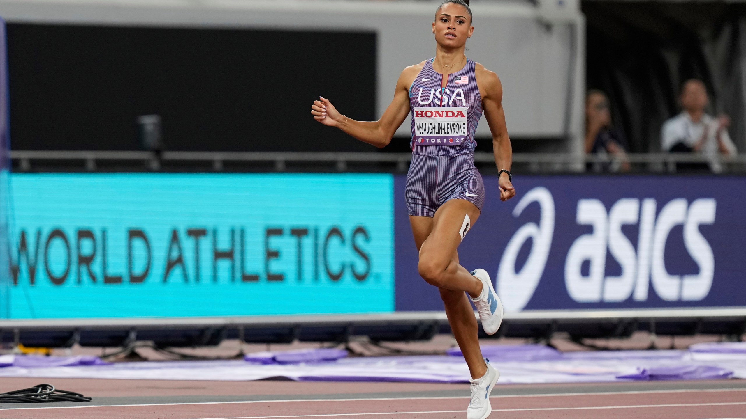 United States' Sydney McLaughlin-Levrone competes in the women's 400 meters semifinal at the World Athletics Championships in Tokyo, Tuesday, Sept. 16, 2025. (AP Photo/Eugene Hoshiko)