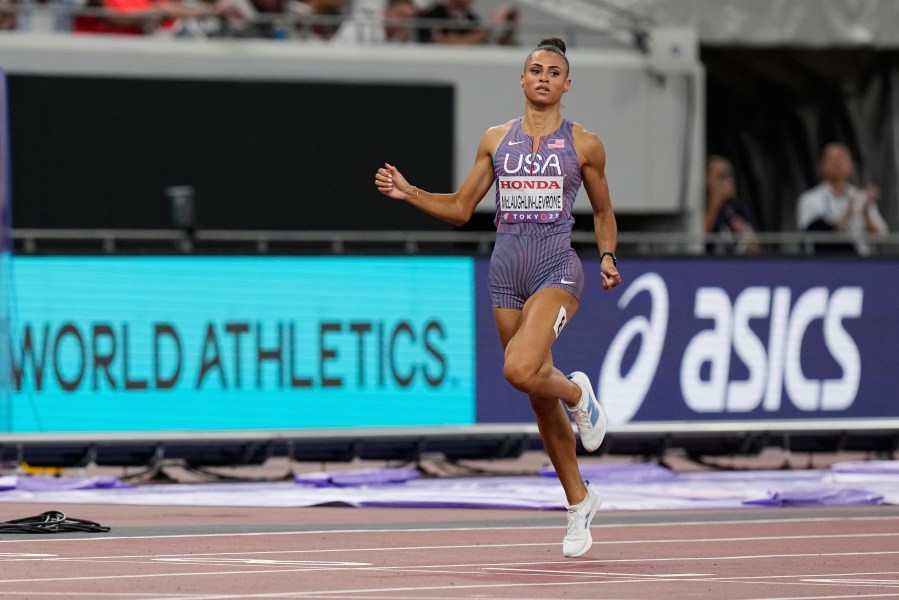United States' Sydney McLaughlin-Levrone competes in the women's 400 meters semifinal at the World Athletics Championships in Tokyo, Tuesday, Sept. 16, 2025. (AP Photo/Eugene Hoshiko)