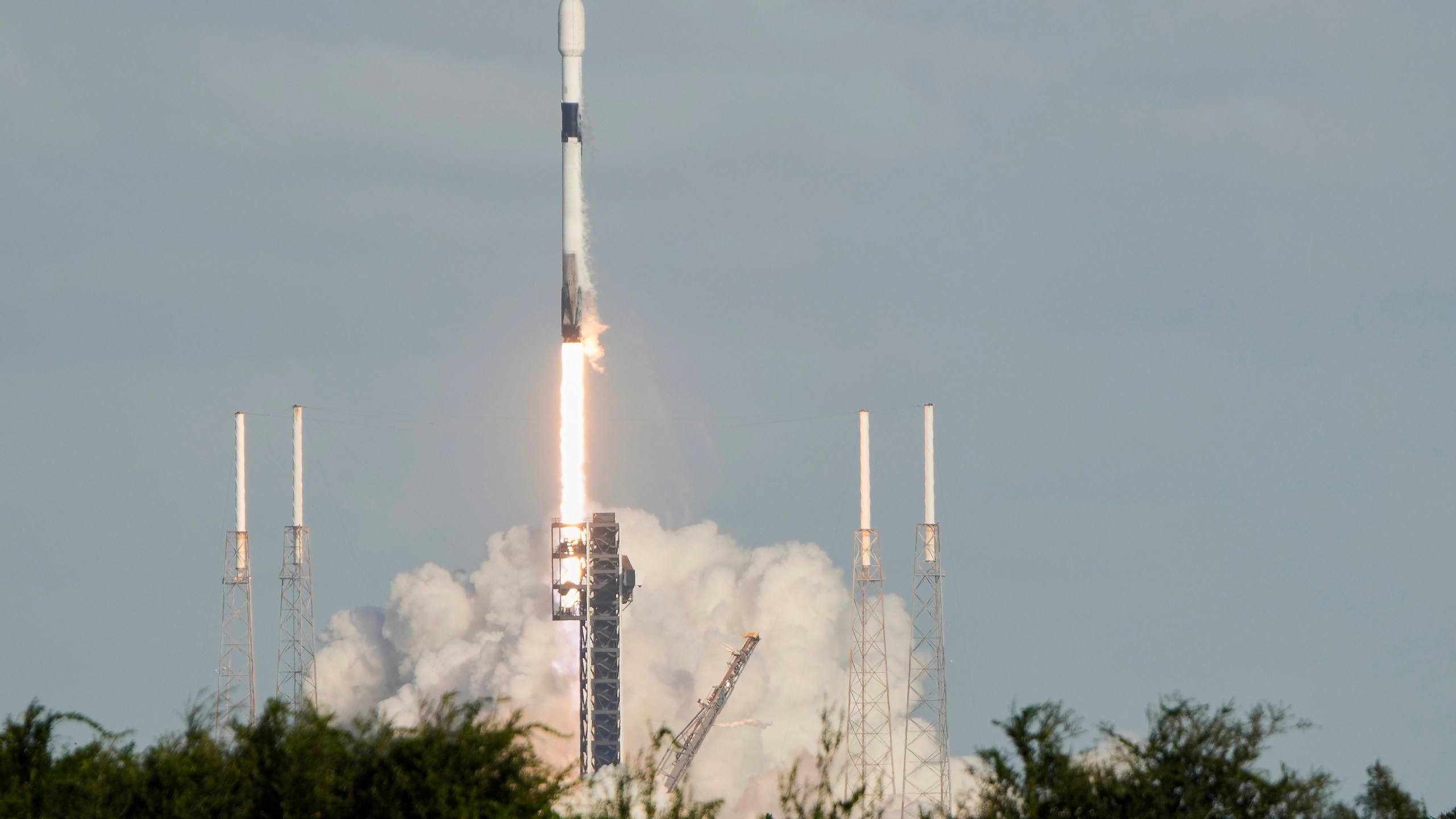 A SpaceX Falcon 9 rocket on a mission to bring supplies to the International Space Station lifts off from complex 40 at the Cape Canaveral Space Force Station in Cape Canaveral, Fla., Sunday, Sept. 14, 2025. (AP Photo/John Raoux)