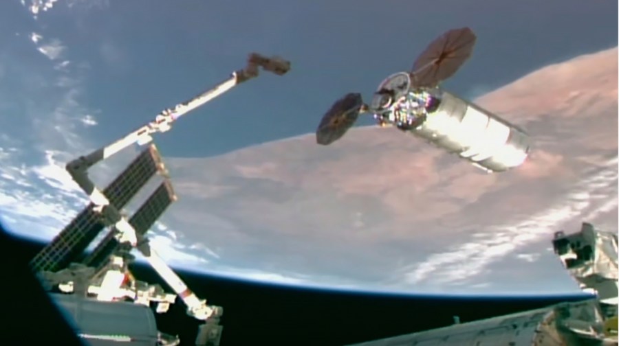 This image provided by NASA shows Northrop Grumman's newly arrived cargo capsule at the International Space Station on Thursday, Sept. 18, 2025. (NASA via AP)