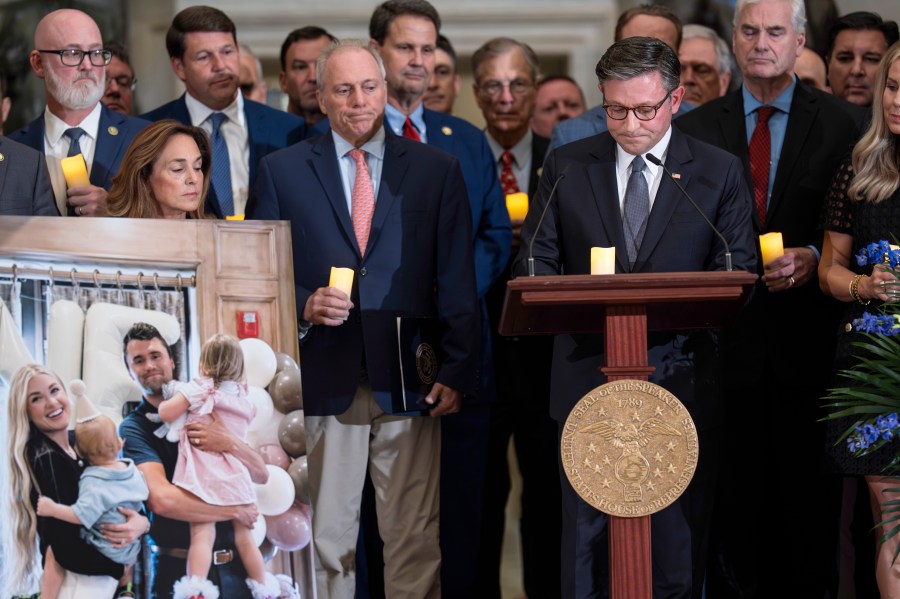 Speaker of the House Mike Johnson, R-La., right, joined by Majority Leader Steve Scalise, R-La., center left, leads a vigil to honor conservative activist Charlie Kirk who was shot and killed at an event in Utah last week, at the Capitol in Washington, Monday, Sept. 15, 2025. (AP Photo/J. Scott Applewhite)