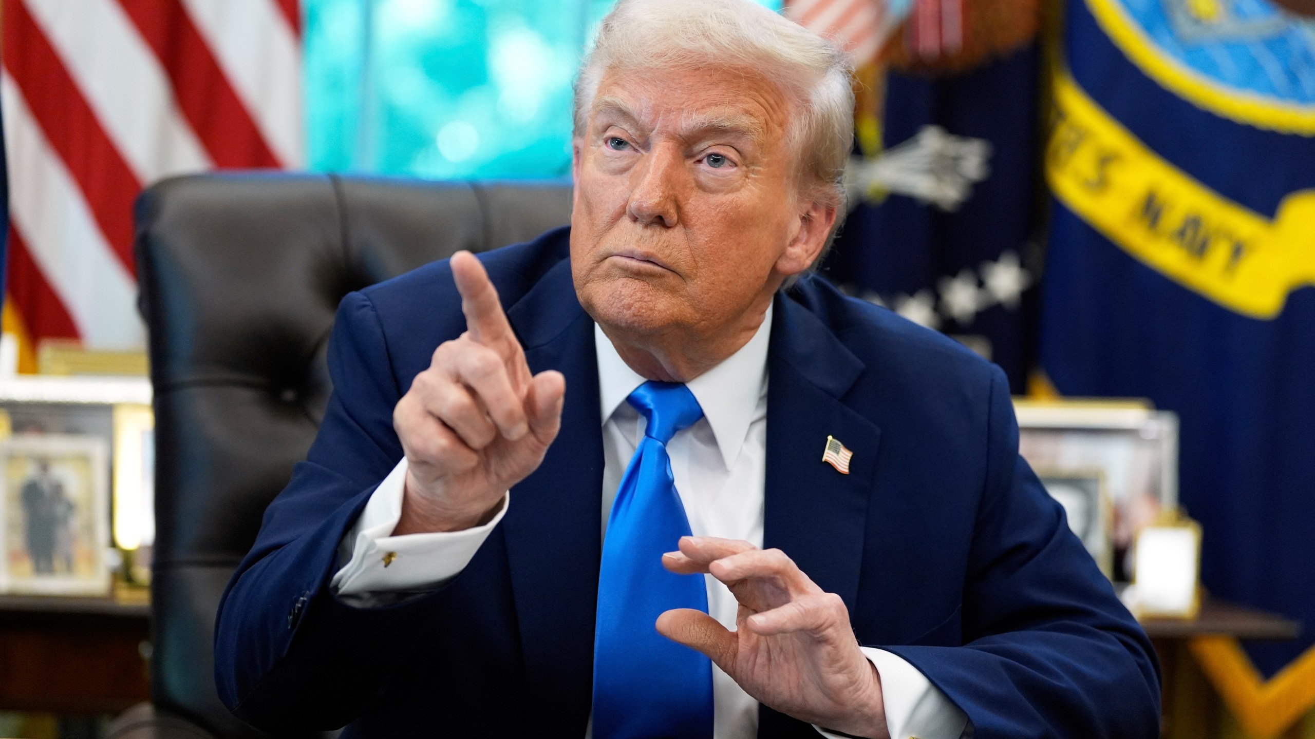 President Donald Trump speaks in the Oval Office of the White House, Friday, Sept. 19, 2025, in Washington. (AP Photo/Alex Brandon)