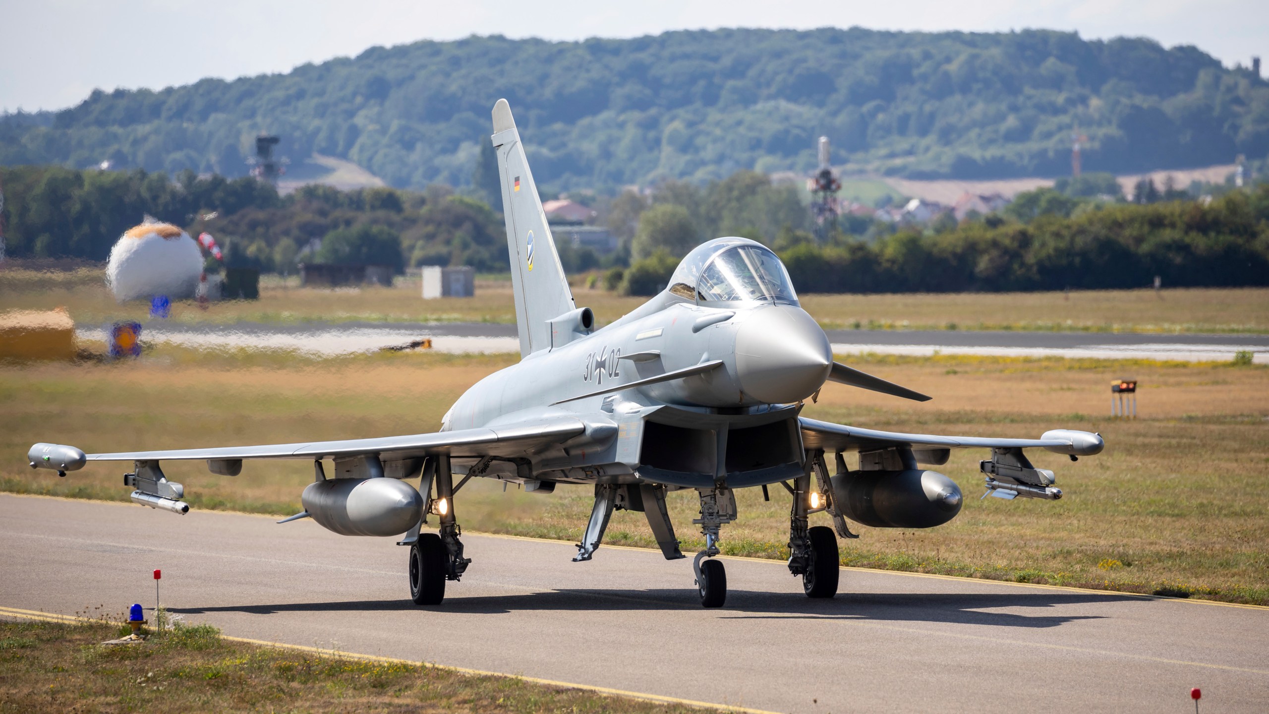 FILE - A German Eurofighter gets ready for takeoff at Neuburg Air Base in Neuburg An Der Donau, Germany, Monday Aug. 15, 2022. (Daniel Karmann/dpa via AP, File)