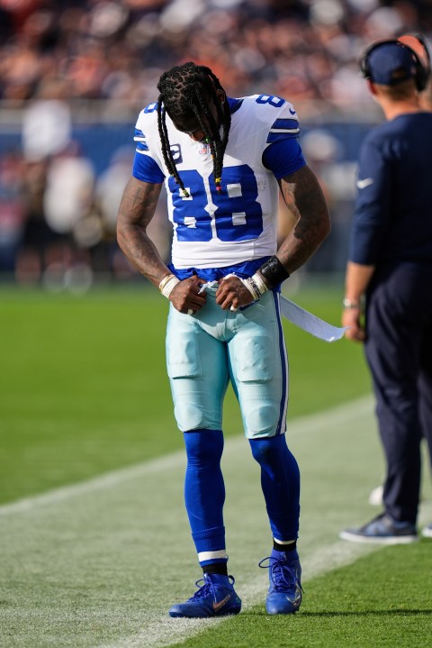 Dallas Cowboys wide receiver CeeDee Lamb walks along the sideline after suffering an unknown injury in the first half of an NFL football game against the Chicago Bears Sunday, Sept. 21, 2025, in Chicago. (AP Photo/Erin Hooley)