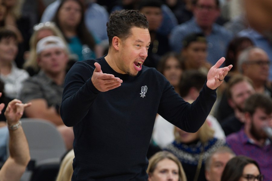 San Antonio Spurs head coach Mitch Johnson yells to his players during the first half of an NBA basketball game against the Toronto Raptors, Monday, Oct. 27, 2025, in San Antonio. (AP Photo/Darren Abate)